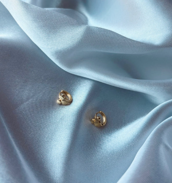 The Art of Adornment: Styling Tips with Gold Mouse Huggies